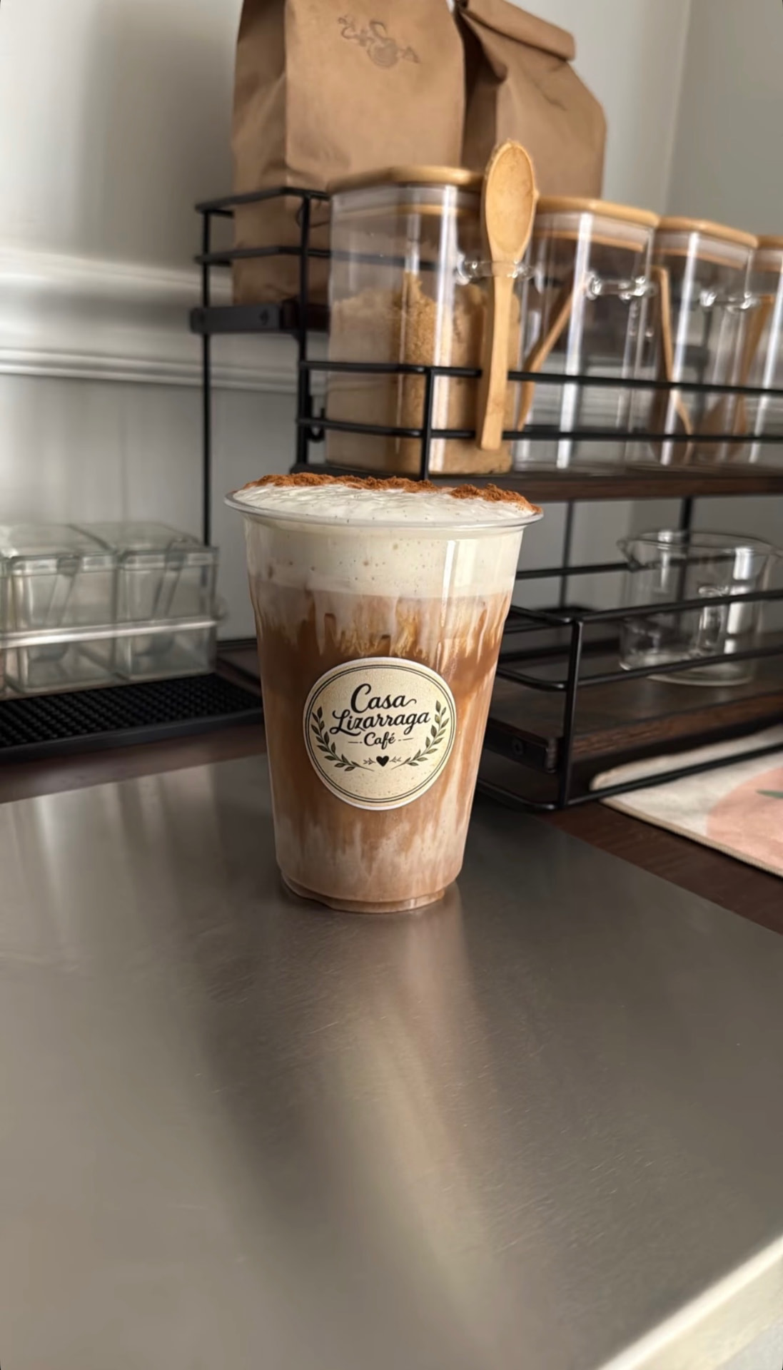 Iced Spanish latte with cinnamon foam